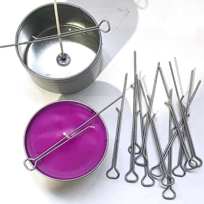 Kovový držák svíčkového knotu - SPONA